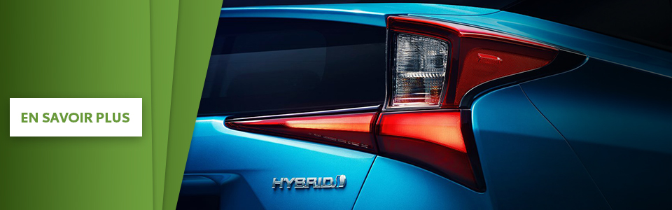 en savoir plus ; le derrière d'une Prius turquoise Hybrid